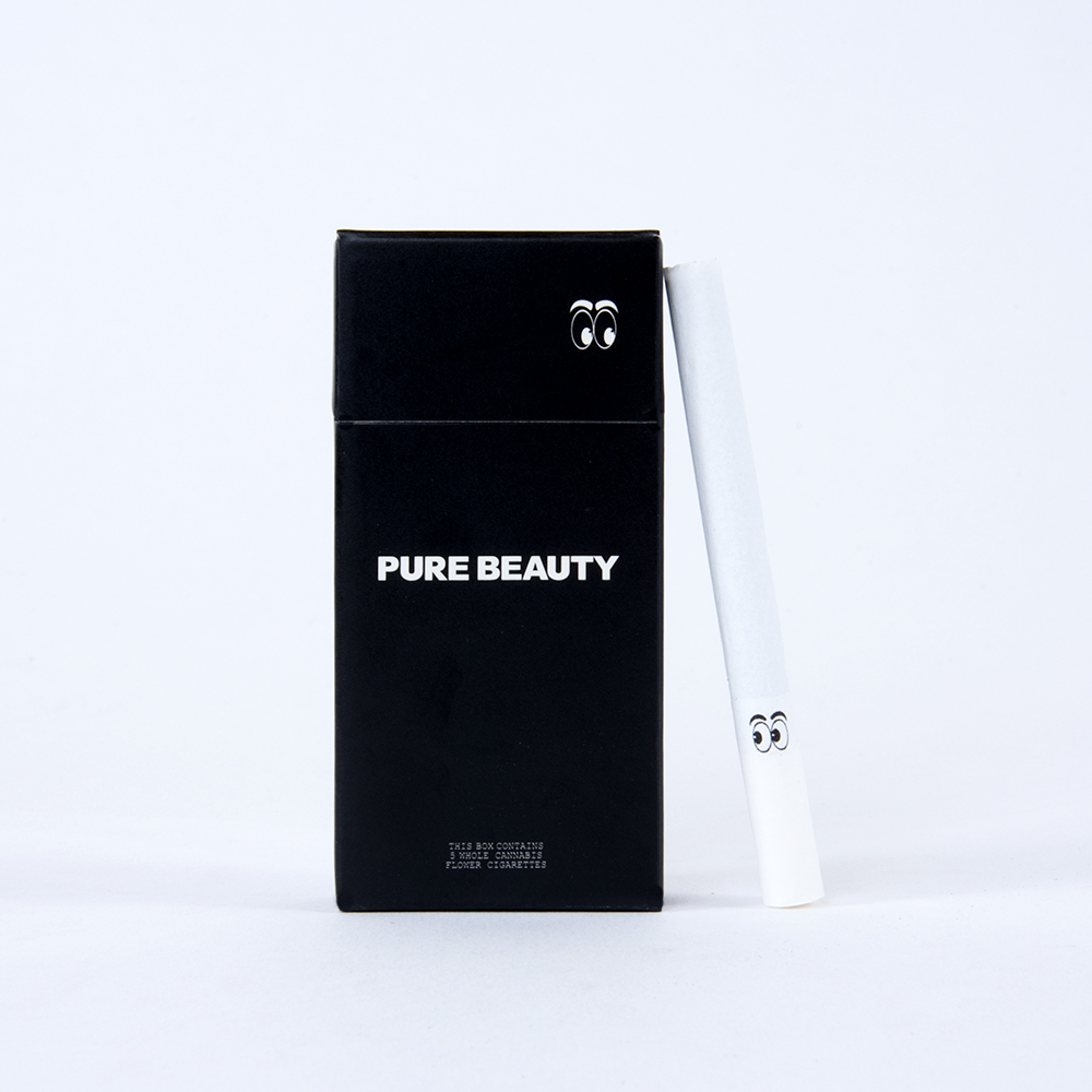 A photograph of Pure Beauty Cannabis Cigarettes 5pk Black Box Hybrid 16ct